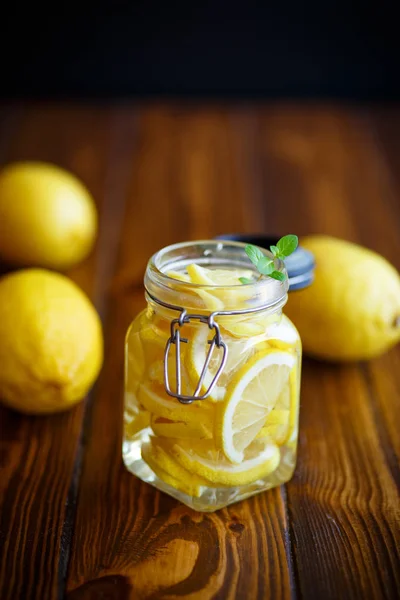 Pickled lemons in sugar syrup — Stock Photo, Image