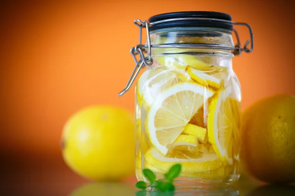 Pickled lemons in sugar syrup — Stock Photo, Image