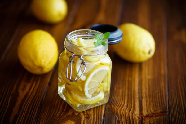 Pickled lemons in sugar syrup — Stock Photo, Image