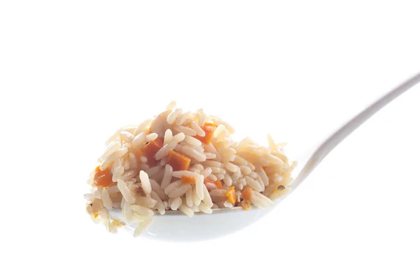 Pilaf in einem großen weißen Löffel gekocht — Stockfoto