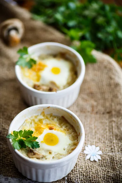 Baked egg with minced fish and mushrooms — Stock Photo, Image