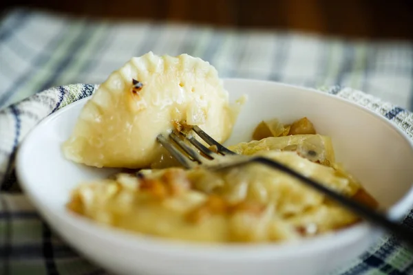 Boiled dumplings with potato filling — Stock Photo, Image