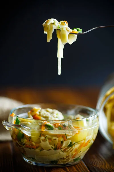 Soup with homemade noodles and meatballs — Stock Photo, Image