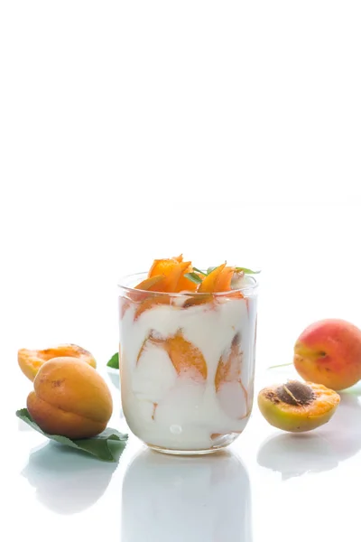 Sweet Greek yogurt with apricots — Stock Photo, Image