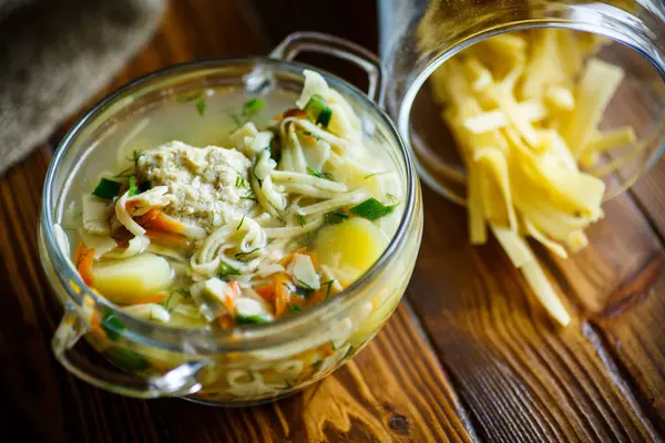 Soup with homemade noodles and meatballs — Stock Photo, Image