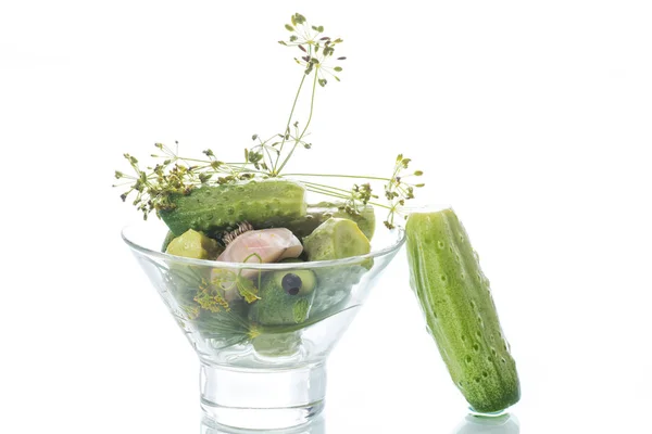 Pickled cucumbers in a glass bowl — Stock Photo, Image