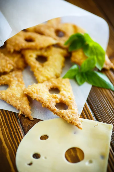 Home cheese crackers in the form of cheese — Stock Photo, Image