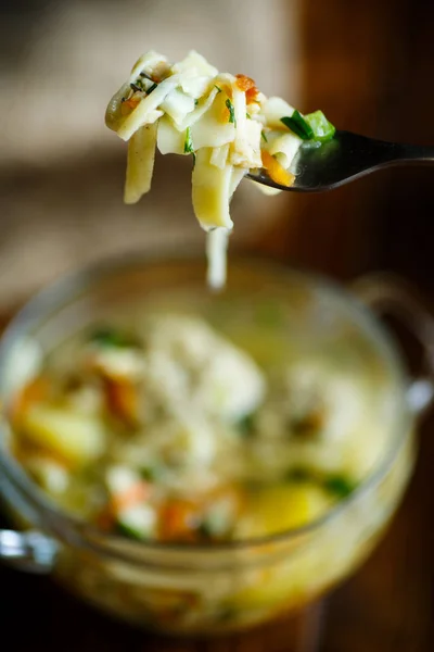 Soup with homemade noodles and meatballs — Stock Photo, Image