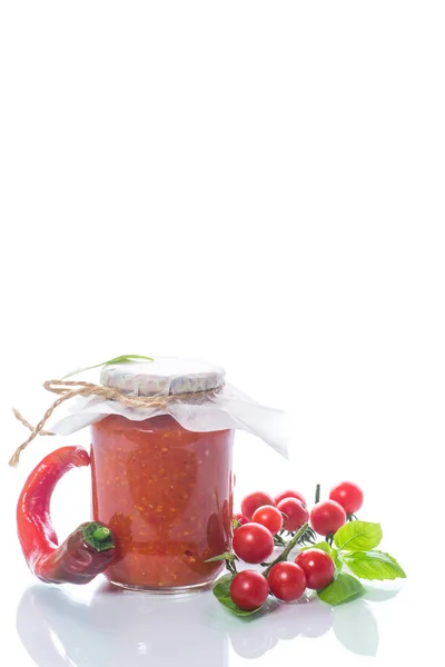 Homemade organic tomato sauce in a glass jar — Stock Photo, Image