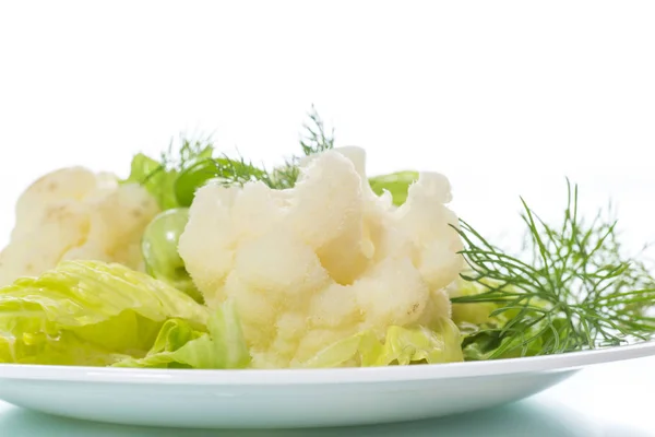 Cauliflower with salad leaves — Stock Photo, Image