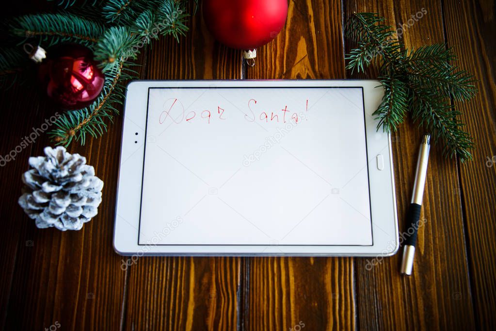 letter to Santa Claus on a tablet
