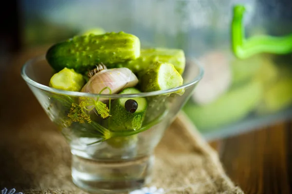 Pickled cucumbers in a glass bowl — Stock Photo, Image