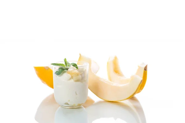 Homemade yogurt with slices of ripe melon — Stock Photo, Image