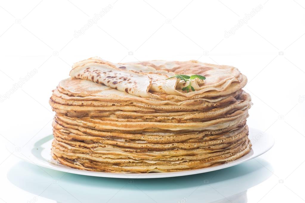 thin delicious pancakes in a plate