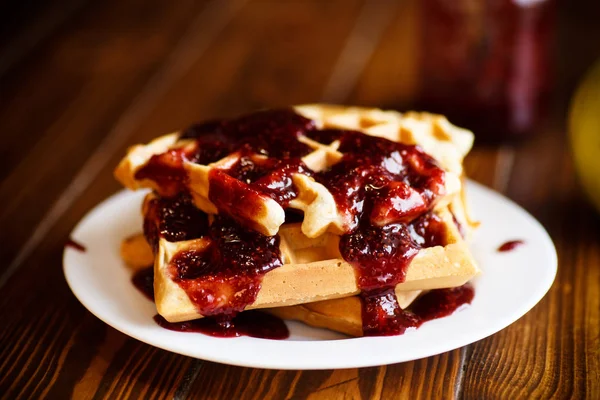 Delicious sweet waffles with jam — Stock Photo, Image