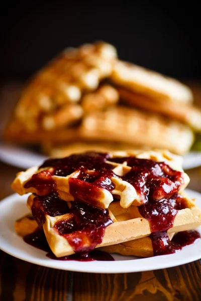 Delicious sweet waffles with jam — Stock Photo, Image