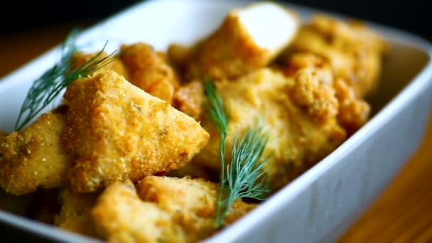 Chicken fried in batter with dill — Stock Video