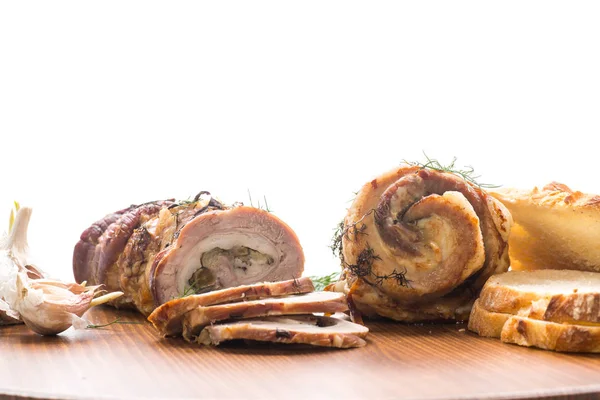 Roll of meat with various spices and herbs — Stock Photo, Image