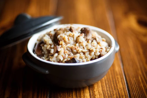 Boiled buckwheat with fried mushrooms — Stock Photo, Image