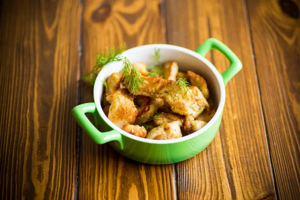 Chicken fried in batter with dill on a plate — Stock Photo, Image