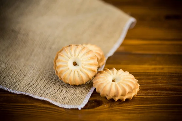 Sweet Crispy Cookies Filling Condensed Milk Wooden Table — Stock Photo, Image