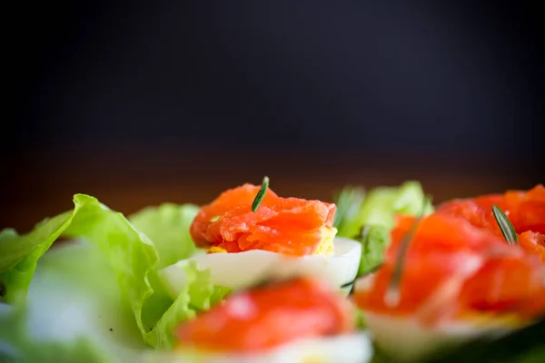 Boiled Eggs Salted Red Fish Salad Leaves Wooden Table — Stock Photo, Image