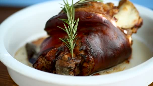 Baked Pork Shank Spices Ceramic Form Wooden Table — Stock Video