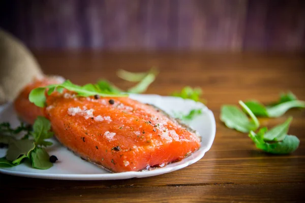 Piece Salty Red Fish Different Seasonings Herbs Plate Wooden Table — Stock Photo, Image