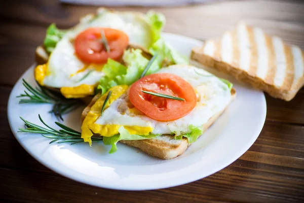 Fried Toasts Egg Salad Tomato Plate Wooden Table — Stock Photo, Image