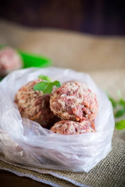 Frozen Raw Meatballs Beef Pork Carrots Rice Cellophane Bag — Stock Photo, Image