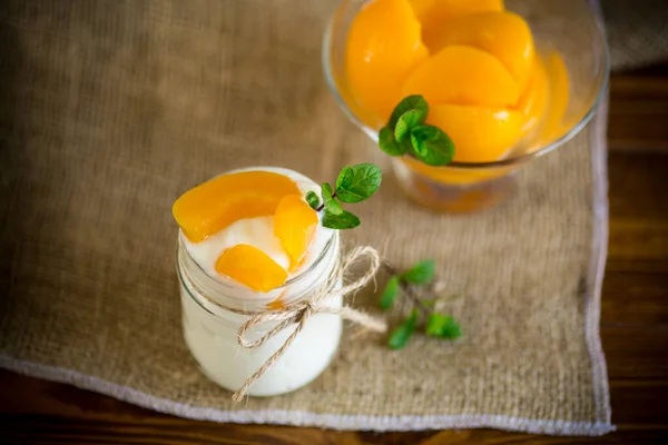 Homemade Sweet Yogurt Slices Pickled Peaches Glass Jar Wooden Table — Stock Photo, Image