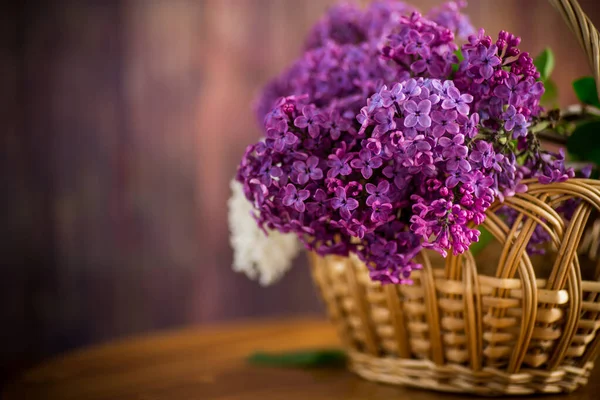 Bouquet Beautiful Blooming Lilacs Basket Wooden Table — Stock Photo, Image