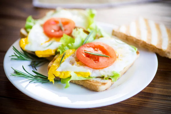 Fried Toasts Egg Salad Tomato Plate Wooden Table — Stock Photo, Image