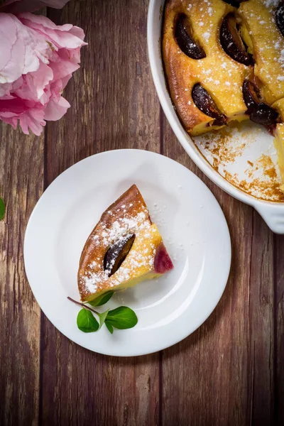 sweet homemade casserole with fruits inside in a plate