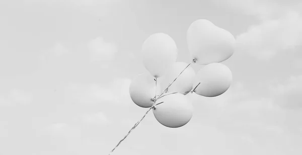 White balloons on blue sky — Stock Photo, Image