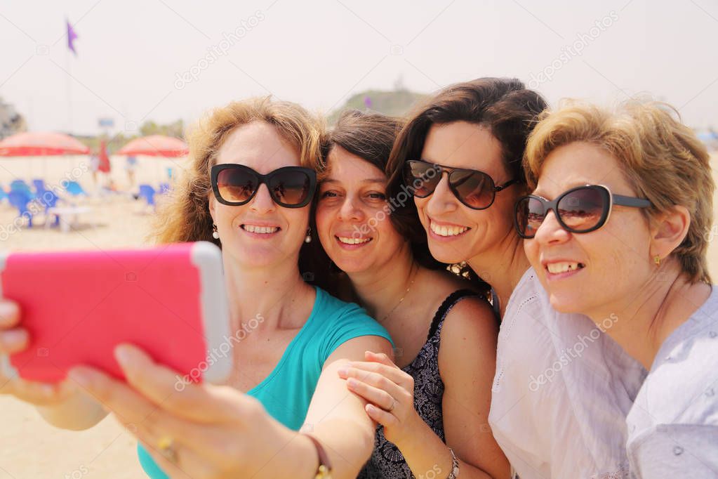 mature women making selfie 