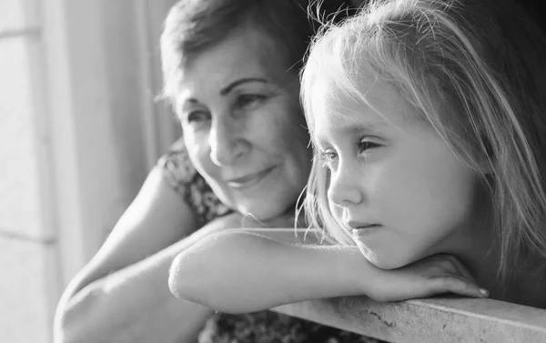 Portrait of grandmother with granddaughter — Stock Photo, Image