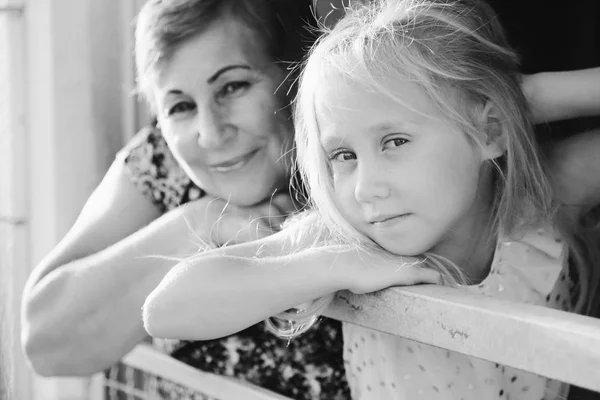 Portrait of grandmother with granddaughter — Stock Photo, Image