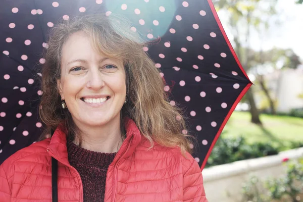 Outdoor portrait of happy smiling mature woman — Stock Photo, Image