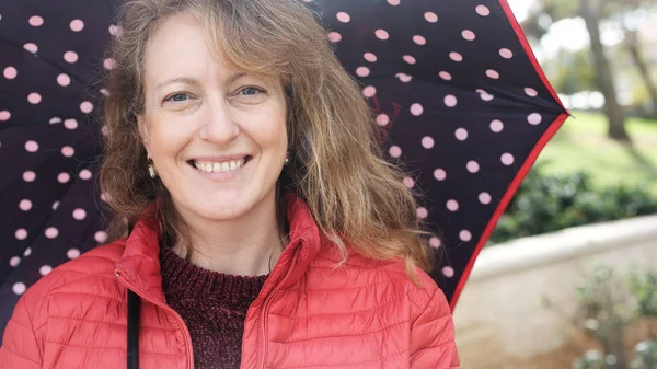 Outdoor portrait of happy smiling mature woman — Stock Photo, Image