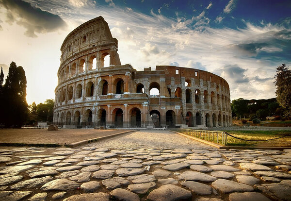 Cloudy dawn over roman Colosseum in Italy