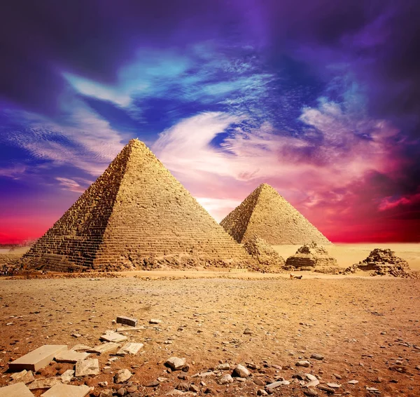 Pyramids and violet clouds — Stock Photo, Image