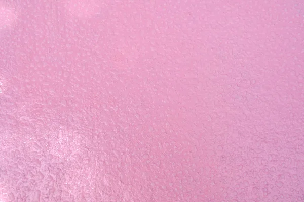 Kropla deszczu streszczenie na podłodze różowe — Zdjęcie stockowe