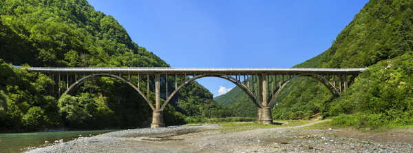 Caucasian bridge and river