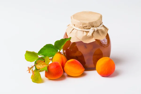 Apricot jam in a glass jar — Stock Photo, Image