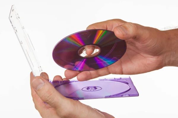 CD-ROM in the box in hand — Stock Photo, Image