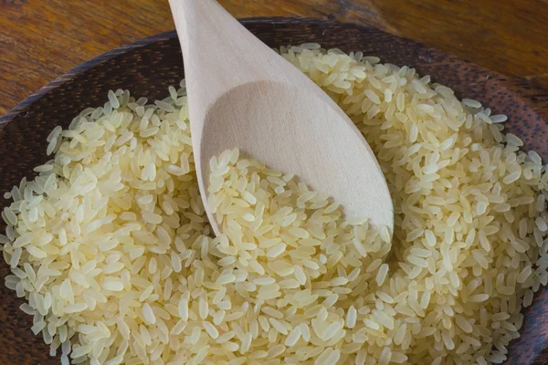 Rijst Plaat Met Een Houten Lepel — Stockfoto