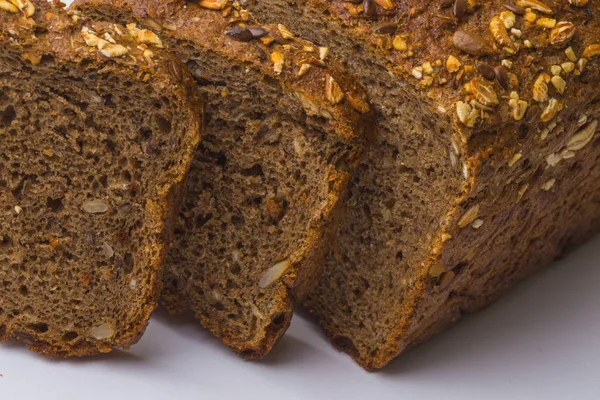 Dark rue bread with sunflower seeds — Stock Photo, Image