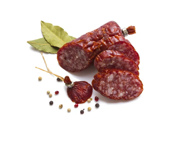 Sliced ​​sausage with spices — Stock Photo, Image