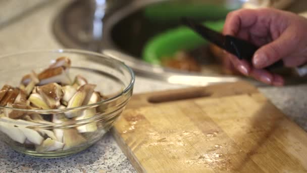 Sliced Mushrooms Kitchen Cutting Board — Stock Video